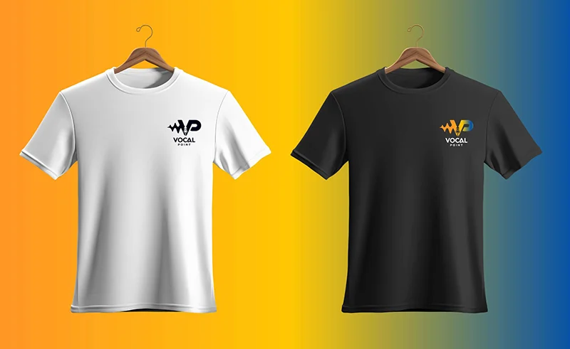 Two T-Shirts On Wooden Hangers Displayed Against A Yellow-To-Blue Gradient Background.